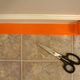 Image for article titled DIY: How To Give Your Apartment A Bold New Floor For Less Than $100